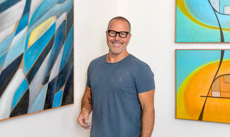 Big Mike Arnone standing in his gallery